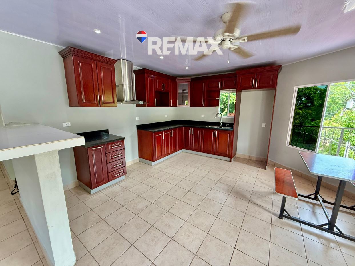 BETWEEN MOUNTAINS AND NEAR THE BEACH